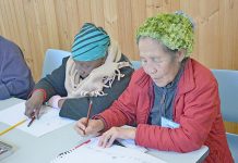 Karen refugees celebrate city settlement