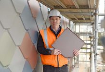 Silvy hangs up hard hat