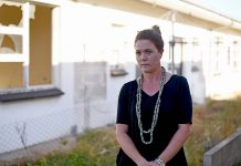 Derelict flats frustrate city business operator