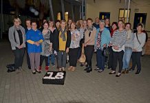 Vigil shines light on violence shame