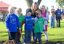 Students help plant Cave Gardens tree