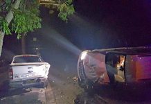 Provisional license holder rolls vehicle following crash with parked utility