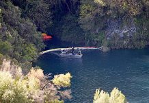 Recovery team ready to retrieve crashed vehicle