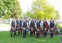 Pipe bands play in unison