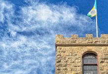 Lone piper sounds across Valley Lake