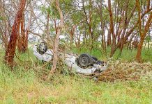 Woman walks away uninjured from car rollover