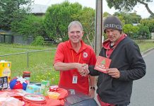 Red Cross volunteers deliver Christmas hampers