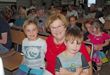 Hark now hear the community sing