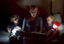 Landmarks ‘plunge into darkness’ to support national event Matthew Emily And Tommy Izzard Reading By Torchlight Ready For Earth Hour TBW Newsgroup