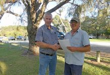 Wattle Range elected members inspect Lake McIntyre progress Council Walk Around The Lake Mayor Des Noll Presenting A Certificate To Gavin Hann P1000093 TBW Newsgroup