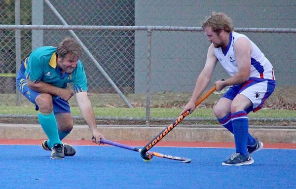 West Veteran Andrew Widdison Goes To The Left Hand In Attempting To Gain Possession From Redbacks Chris Muller In Division 2 Men TBW Newsgroup