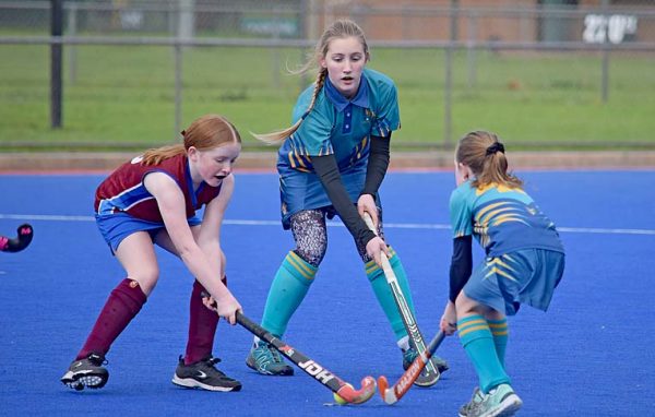 Strikers Brooklyn Hill And West Paige Chambers In A Tussle For The Ball While Wests Lauren Smith Awaits Her Opportunity20190727crop TBW Newsgroup