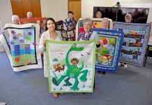 Children kept warm with welfare agency donation Pine Tree Quilters Donation 2 TBW Newsgroup