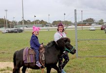Wet weather keeps crowds down at annual city show 13 Emma Farrell And Eshe Beare (child) TBW Newsgroup