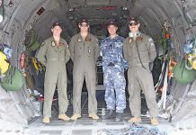 RAAF swoops in to get fireys moving Adf Air Force Members TBW Newsgroup