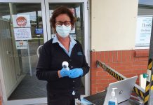 State’s virus testing broadens Registered Nurse Wendy Romboult Assessing Patients For Covid.20200420 TBW Newsgroup