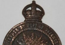 Search to rehome war badge