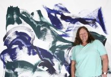 Local artists paints live