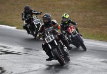 Riders push on through wet Sunday