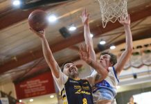 Men stand up down the stretch