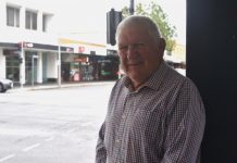 Two candidates put their hands up