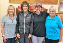 Muhovics withstands weather to win