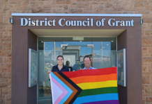 Grant raises pride flag
