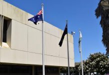 Flags flying together