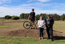 Youth help with pump track