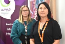 Vigil shines light on violence