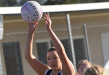 Demons win tight battle