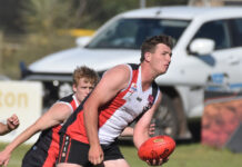 Saints shine under lights