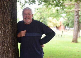 Neville receives highest honour