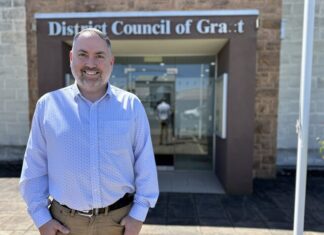 Darryl Whicker waves goodbye